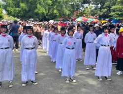 Pemda Parigi Moutong Gelar Lomba Gerak Jalan di Peringatan Hardiknas