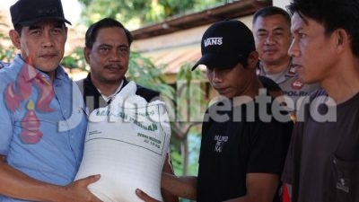 Distribusi Beras Terkendala Jalan Rusak, Bupati Parigi Moutong Kerahkan Alat Berat